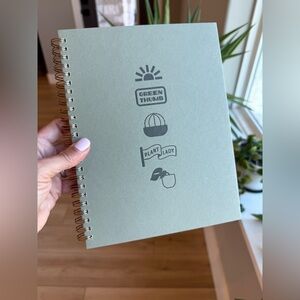 Green Spiral Notebook with Plant Design